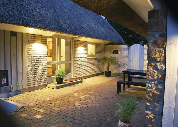 Holiday home Four-bedroom With A Fireplace In *